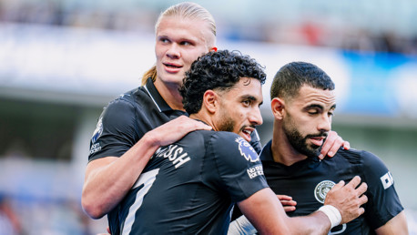 TERRIFIC TRIO: Haaland, Marmoush and Ait-Nouri celebrate.