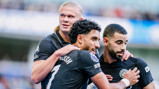 TERRIFIC TRIO: Haaland, Marmoush and Ait-Nouri celebrate.