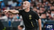 A person coaching wearing a black Manchester City shirt with an 'Asia Tour '26' logo on the side.