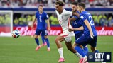 England and Croatia players contest a soccer ball during a match, with focus on England player wearing number 3 jersey.
