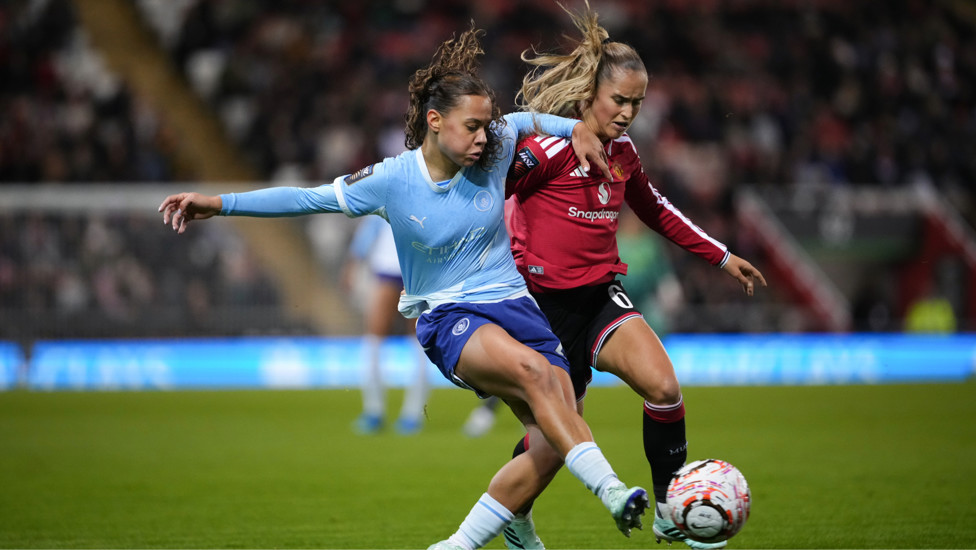 A proper derby : Iman Beney getting straight into the action