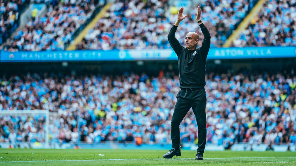 LEADER : The boss looks to get the players spirits up despite being two goals behind.