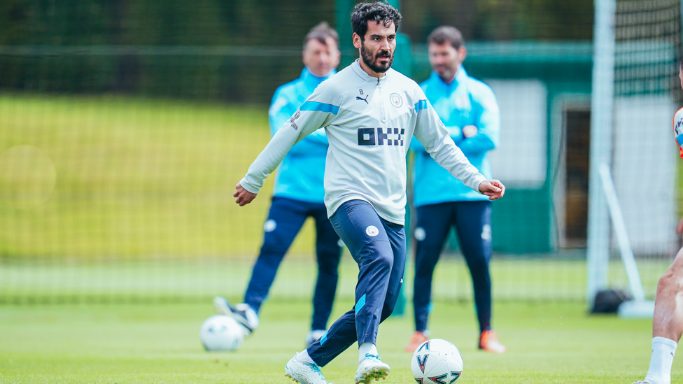 OUR CAPTAIN : Ilkay Gundogan working hard on the ball.
