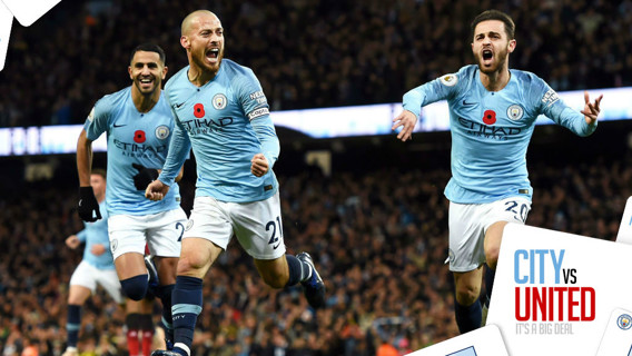 BLUE HEAVEN: David Silva and Bernardo Silva ccelebrate after City's opening goal in our 3-1 derby win over United