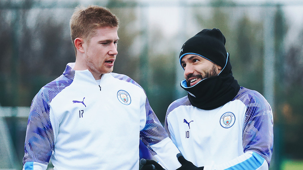 HATS THE WAY TO DO IT : Sergio Aguero takes time out to chat with Kevin De Bruyne