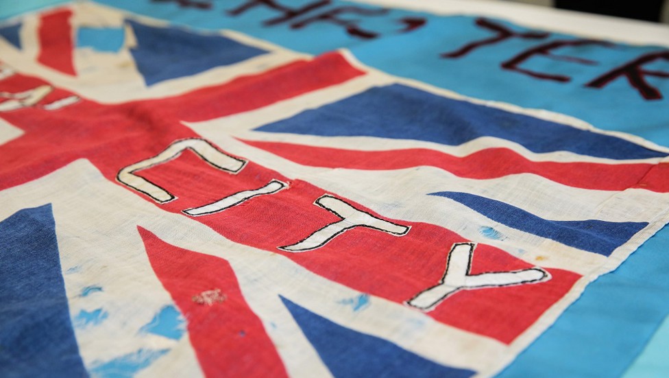 Christine's flag with signatures still visible
