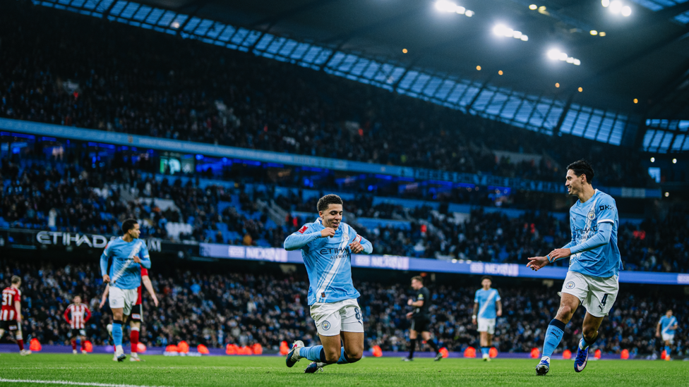 LOVELY LEWIS : Rico celebrates making it 5-0.