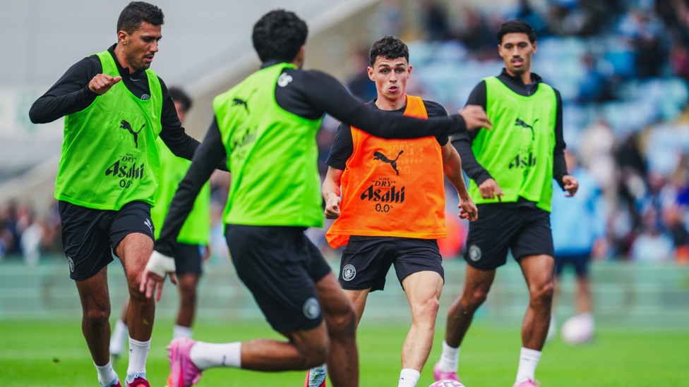 ONE OF OUR OWN  : Phil Foden weaves through bodies.