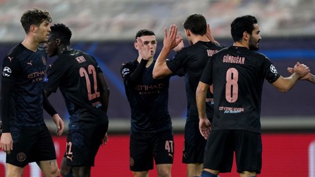 SHARE THE LOVE: They players gather to congratulate Foden after his neat finish.
