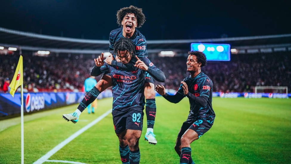 BLUE BOYS : Academy graduates Micah Hamilton, Rico Lewis and Oscar Bobb celebrate at Red Star